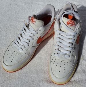 White and orange Nike air force 1